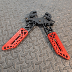 Pine Ridge, repose arc d'occasion orange pour arc à poulies.